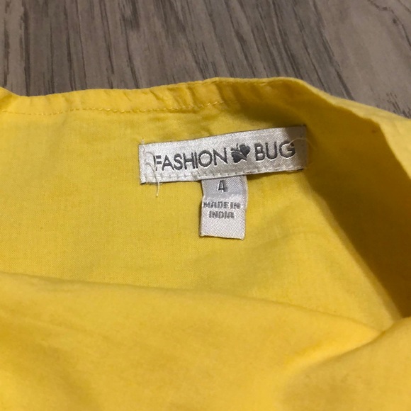 *TWO* skirts. Yellow size 4, black side Small. - Picture 5 of 9